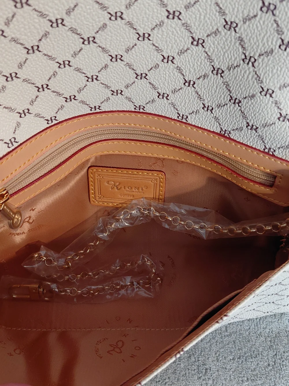 Rioni Cream Monogram Clutch with Gold Emblem